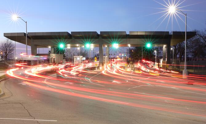 A time lapse photo depicting traffic entering Tinker Air Force Base via the Main Gate Feb. 15, 2024.