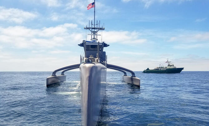The Leidos Seahunter ship cuts through water.