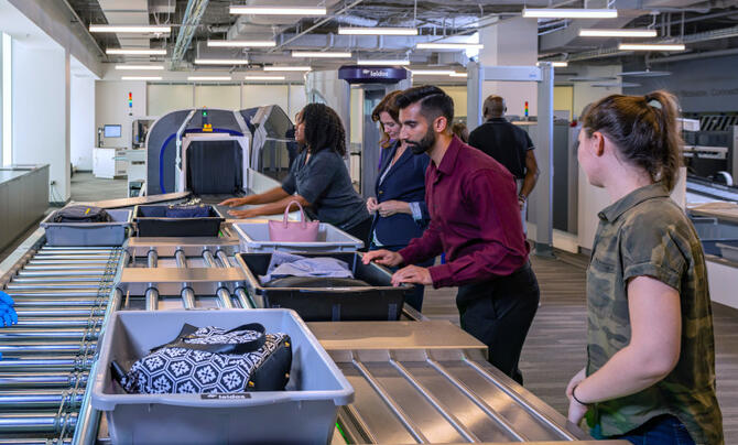 Bags going in Leidos airport scanners