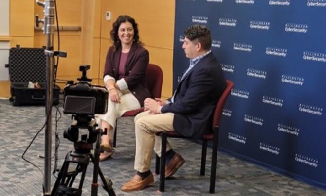 two people filming a webinar