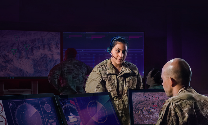 two soldiers in command center