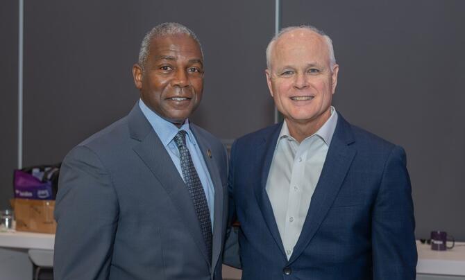 Hampton University President Darrell K. Williams and Leidos CEO Tom Bell 