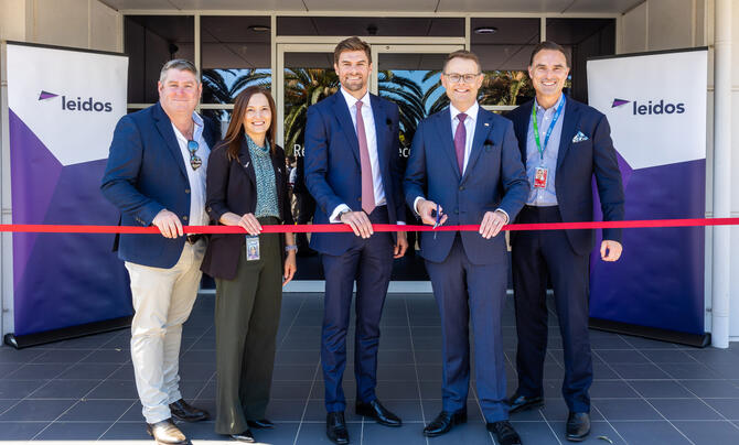 Image of Tom Clark, CEO - Workspace Commercial Furniture, Kerry Cawthorne, Divisional Finance Business Operations Manager - Leidos Australia, James Woodhams, Vice President Airborne Solutions - Leidos Australia, the Hon Stephen Mullighan, South Australian Treasurer and Minister for Defence and Space Industries and Brenton Cox, CEO - Adelaide Airport at the official opening of Leidos' South Australian office