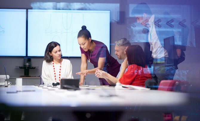 people working in a meeting room