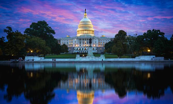 The capital is shown as the sun sets.