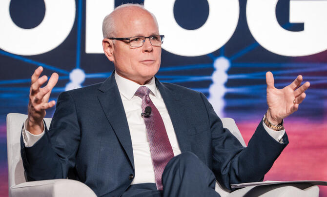 candid photo of Leidos CEO Tom Bell