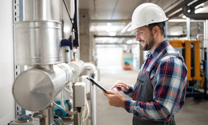 Strategic energy management coach performing an assessment