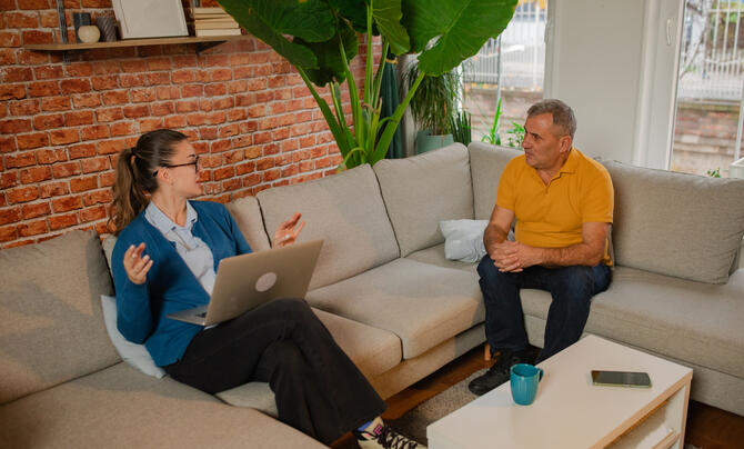A therapist sits across from a client.