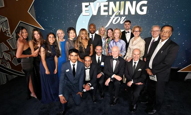 The Leidos team poses together at the gala.