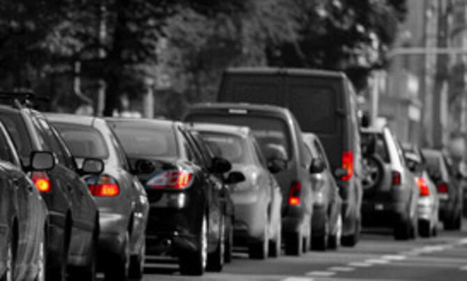 cars lined up at a traffic light