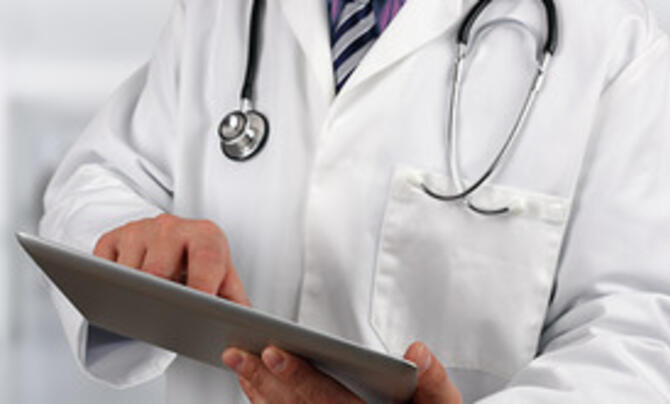 doctor with tablet 