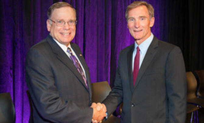 John P. Jumper with CEO Roger Krone 