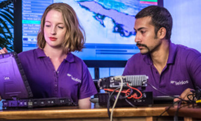 employees working on a laptop