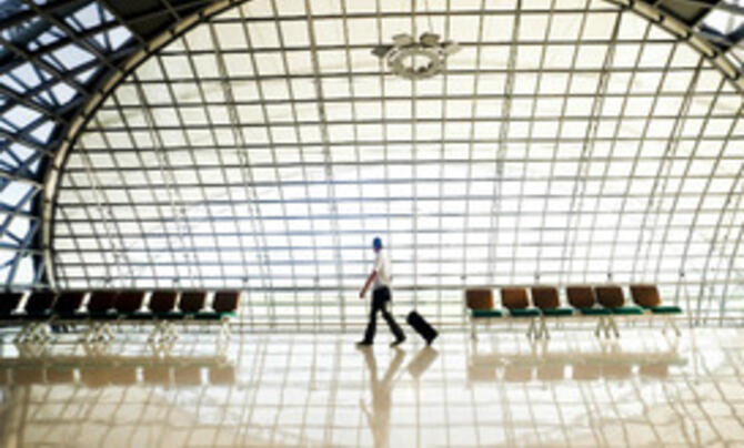 Passenger travelling through an airport