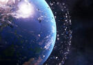 Earth is shown from space surrounded by a dense cloud of satellites and debris orbiting the planet. The scene highlights the crowded environment in Earth’s orbit against a dark starry background.