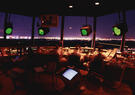 Air traffic controllers in tower at night