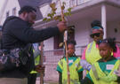 A family plant a tree