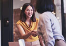 Two people meeting and shaking hands