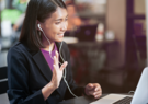 woman doing virtual video interview on laptop