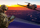 Soldier using tablet to control an airplane