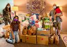QTC volunteers with donated items at House of Ruth