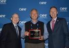 Ameren Illinois and Leidos staff holding AEE Award