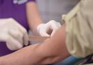 QTC taking blood from veteran