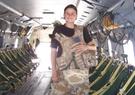 Jasmin in back of a Merlin helicopter in Basra, Iraq, 2007