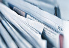 newspapers stacked