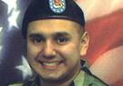 Manuel Pacheco military picture in front of the American flag