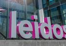 A large 3-D Leidos sign outside the company's headquarters