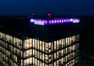 An aerial shot of the top floors of Leidos Global Headquarters ad dusk