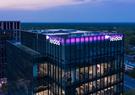 An aerial photograph of Leidos Global Headquarters at dusk