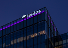 Leidos global headquarters with purple lighting.