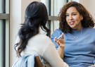 Two women having a conversation