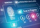 A simulated computer screen showing an analysis of a fingerprint reading "Scan in Progress"