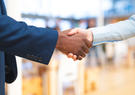 Two businesspeople shaking hands