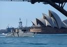 Unmanned surface vessel Seahawk arrives at Sydney Harbor with the Sydney Opera House in the background.