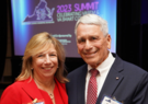 Leidos EVP Vicki Schmanske accepting her election to the  Virginia Academy of Science, Engineering and Medicine from President James Aylor.