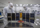 Test Engineers prepare the Lonestar Tactical Space Support Vehicle in Leidos Dynetics facility clean room.  The Lonestar program officially completed its extended journey in orbit in December. (Gary Gee/Leidos Dynetics)