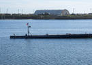 An Autonomous Low-Profile Vessel stands by at the Del Mar Boat Basin as part of Project Convergence Capstone Four, Feb. 23, 2024, at Camp Pendleton, CA.