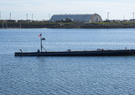 An Autonomous Low-Profile Vessel stands by at the Del Mar Boat Basin as part of Project Convergence Capstone Four, Feb. 23, 2024, at Camp Pendleton, CA.