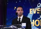Milad Brahrami speaking at an Evening for Hope gala