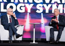 Leidos CEO Tom Bell (left) and retired Gen. James Mattis (right) discuss the ways industry can deliver technology to complex government missions. (Visuals by J. McKenzie)