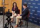 two people filming a webinar