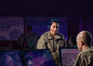 two soldiers in command center