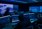 people in a command center