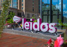 Leidos logo sign in front of building