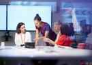 people working in a meeting room
