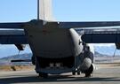 A ramp is attached to a C-130 for SCM test launch.